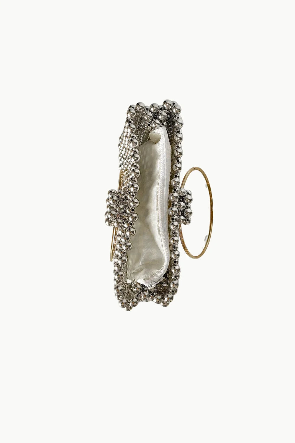 Silver beaded pearl cage bag with pearl-like closure and gold ring handle