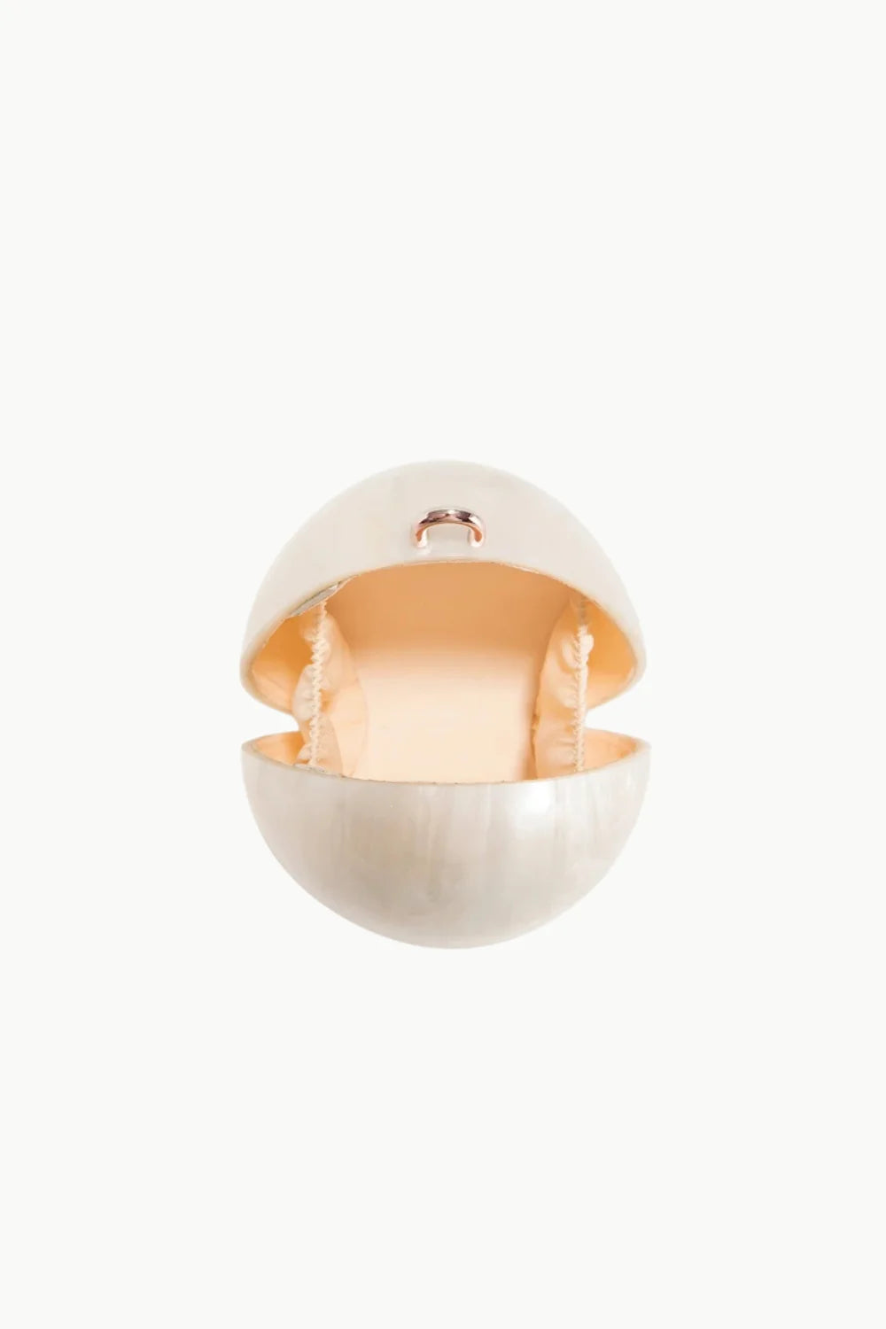 Pearl embellished spherical bag with open pearl-colored spherical container and peach interior