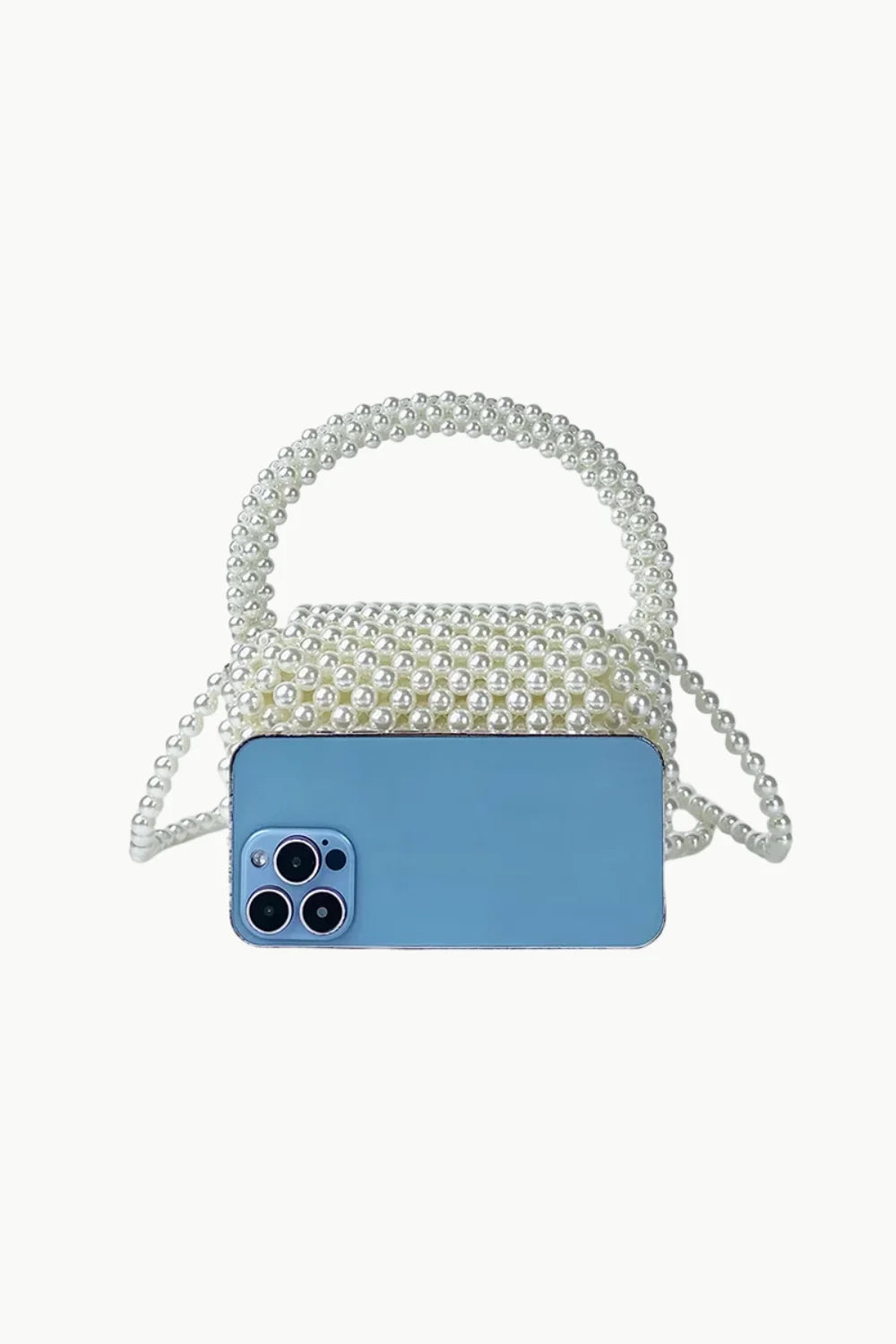 White pearl beaded shoulder bag with top handle and shoulder strap for elegant style