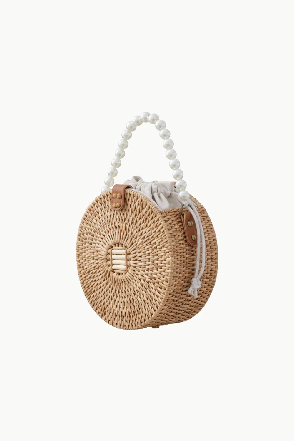 Round woven rattan pearl straw bag with top handle and drawstring closure