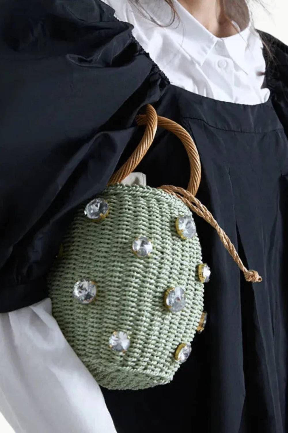 Light green woven straw rattan bucket bag with rhinestones and twisted gold handle