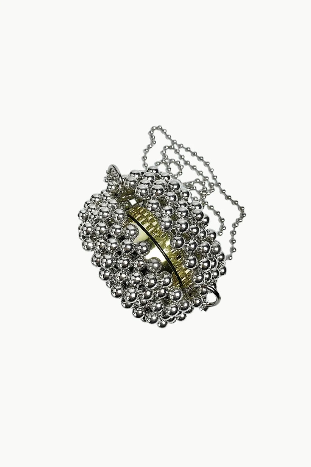 Silver beaded clutch with gold-toned top handle for elegant evening occasions