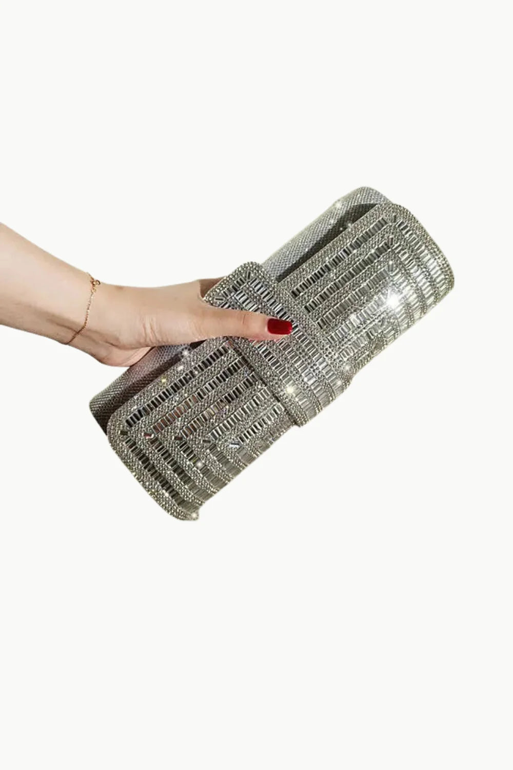 Sparkling silver beaded clutch bag with fold-over design, perfect for elegant occasions