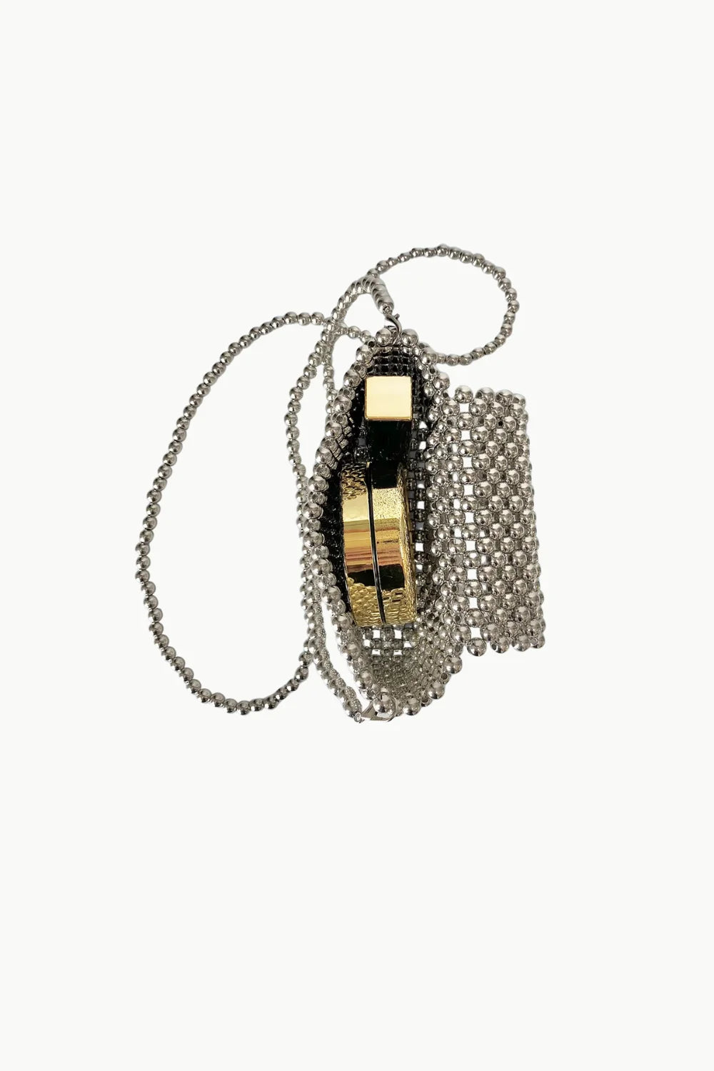 Silver beaded crossbody bag with gold clasp and long chain strap for stylish outings