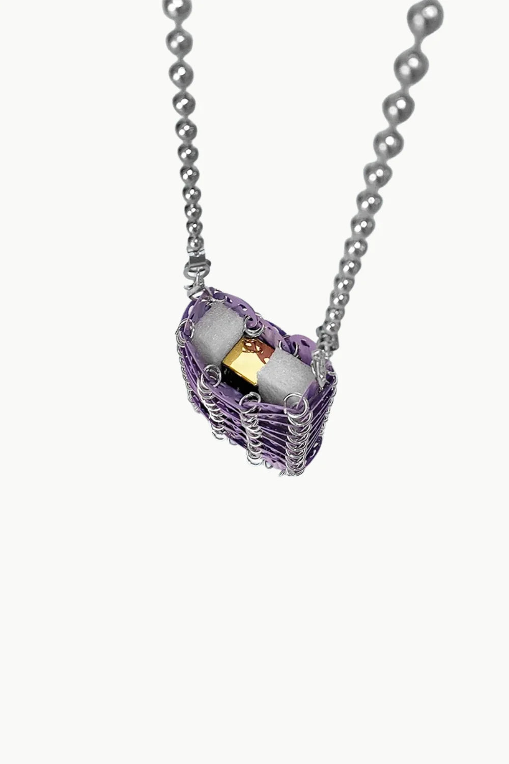 Silver beaded phone bag with purple mesh necklace and white gold stones