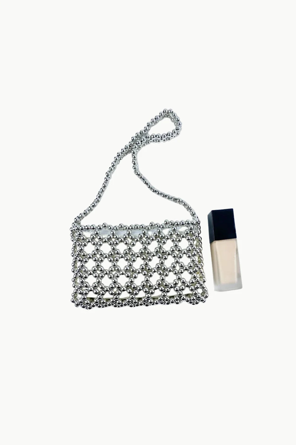 Silver beaded shoulder bag with a strap, stylish silver beaded shoulder accessory