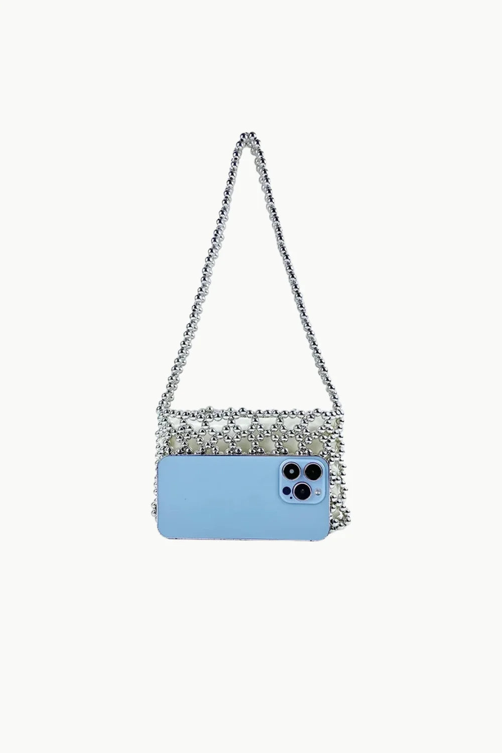 Silver beaded shoulder bag with light blue phone inside showcasing stylish accessory