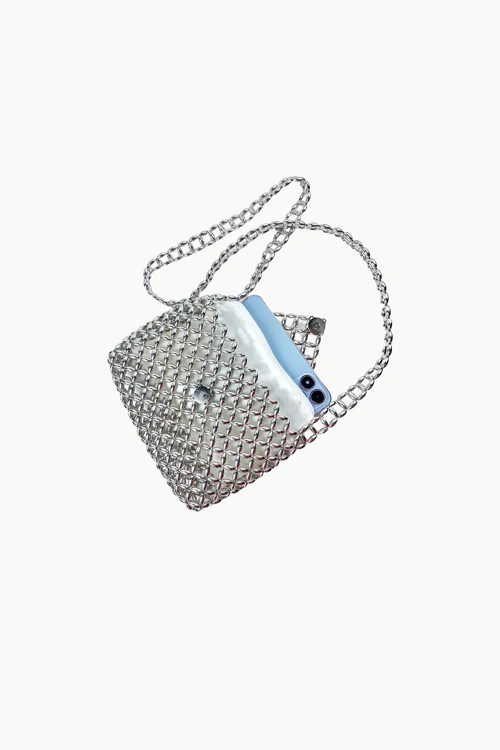 Silver chain crossbody beaded bag with sparkly silver tone and light blue phone inside