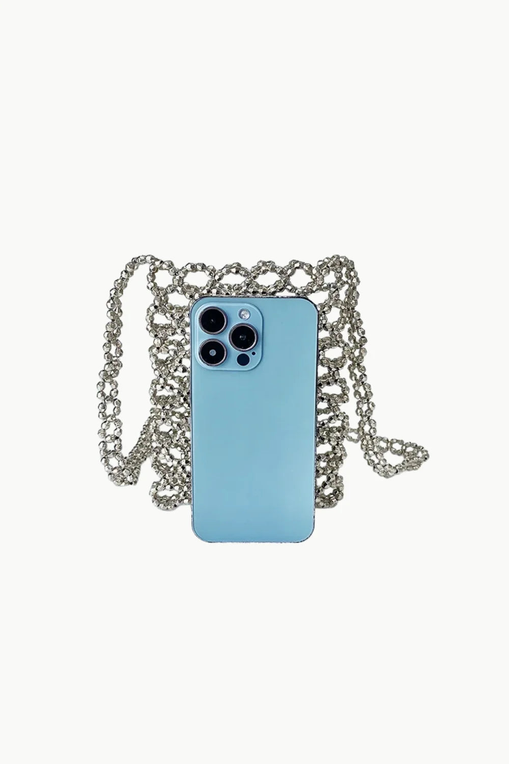 Light blue iPhone with silver chain shoulder strap on a small beaded crossbody bag
