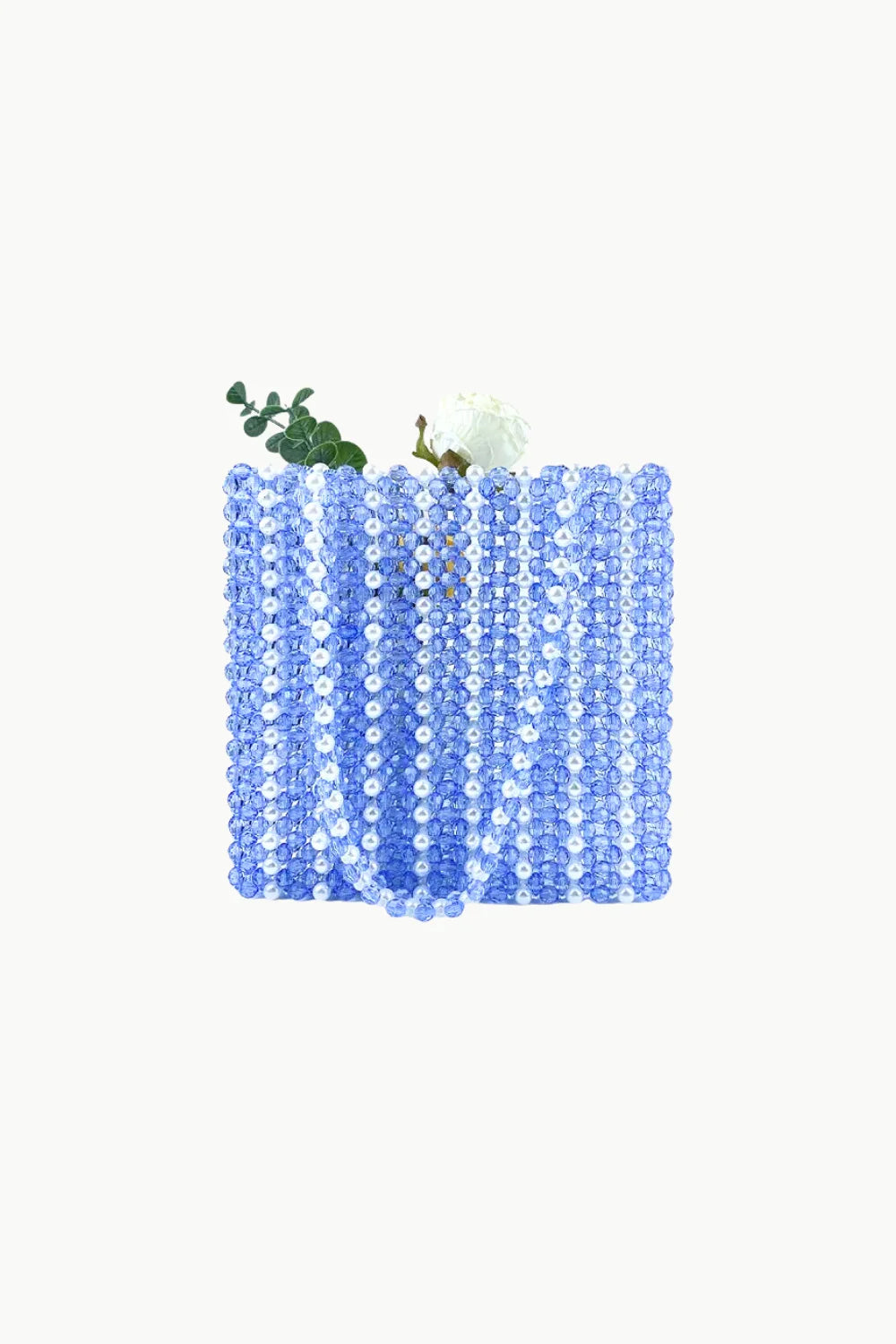 Sol Mer beaded bag with white flower and green foliage for stylish accessories