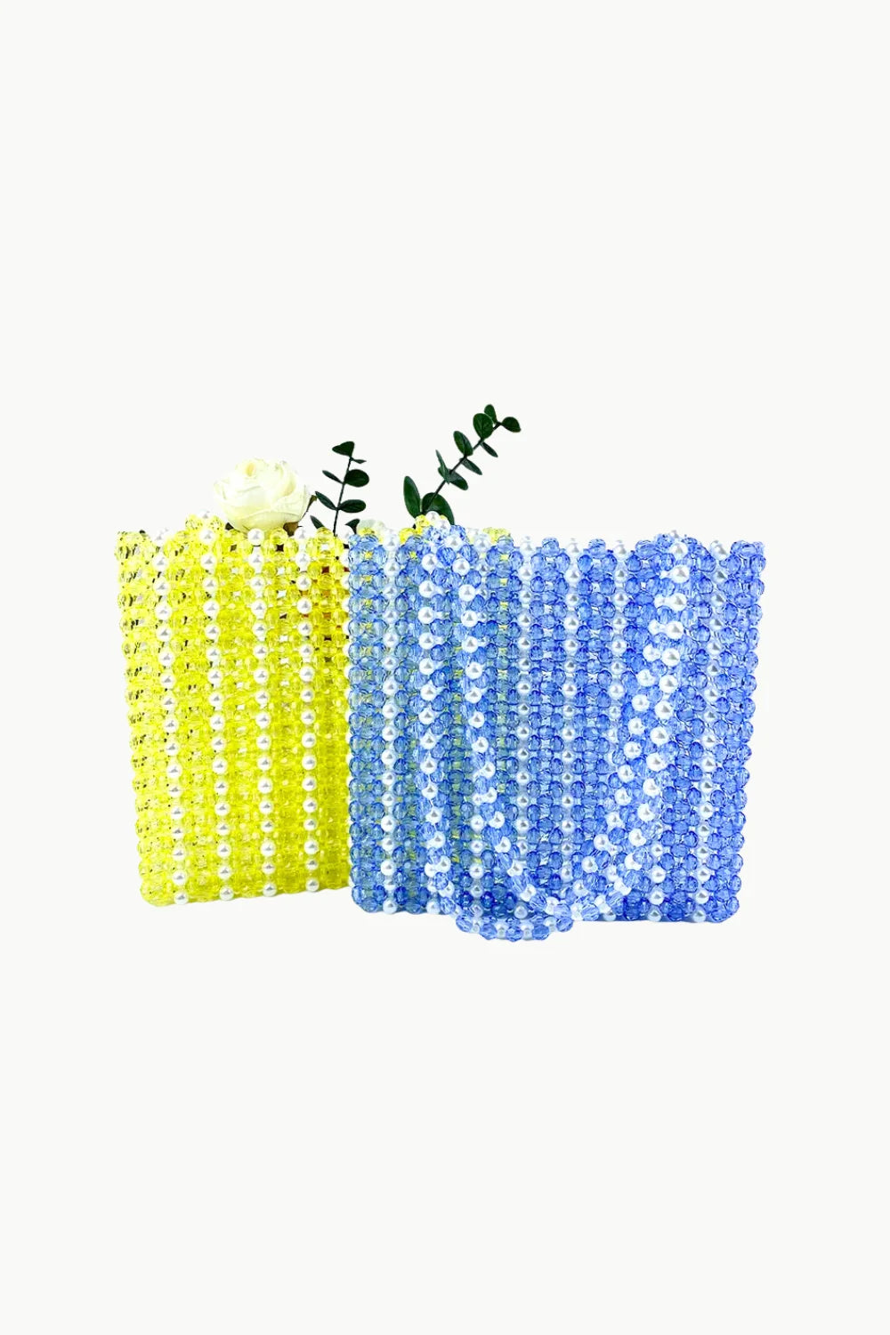 Sol Mer beaded bag with decorative yellow and blue planters and small green plants