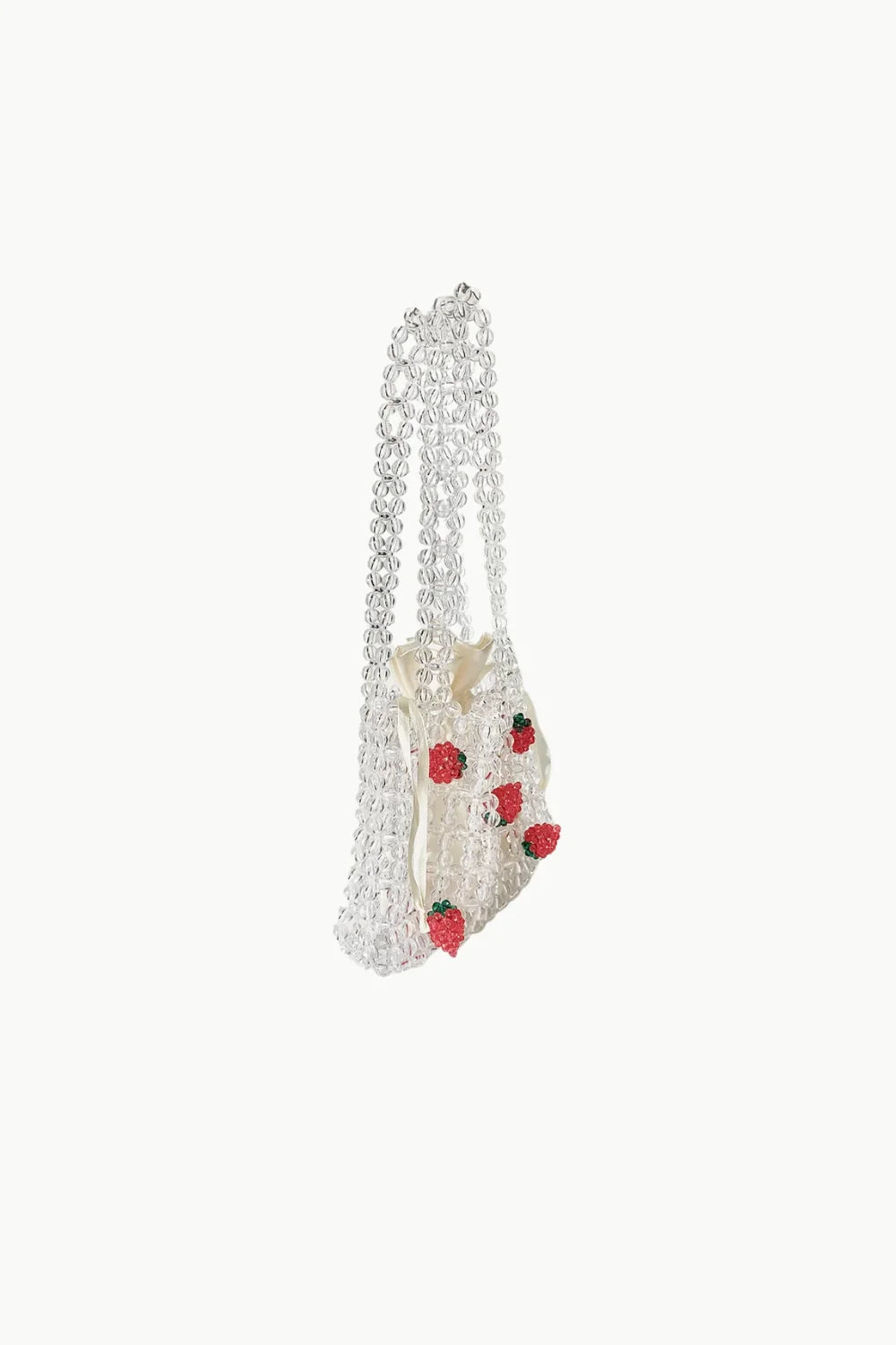 White beaded bag with red strawberry embellishments, perfect for a stylish strawberry beaded bag look