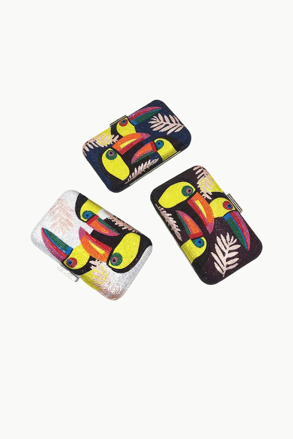 Three rectangular toucan beaded bags with tropical leaf embroidery for the Toucan Beaded Bag collection