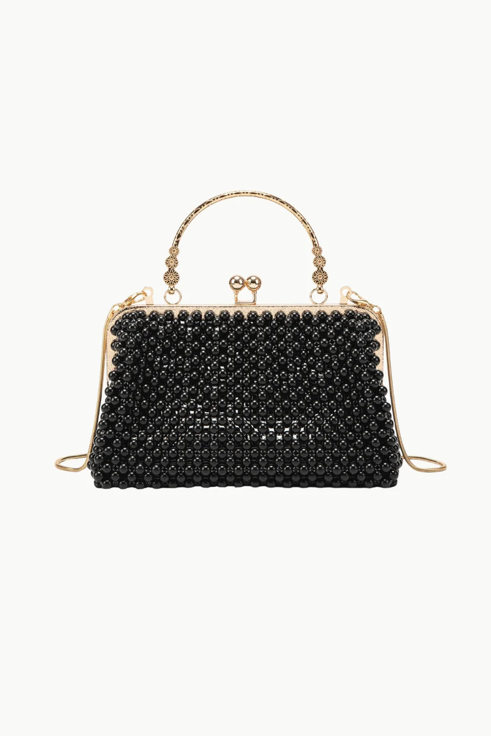 Vintage pearl beaded clutch bag with black beads, gold frame, and top handle