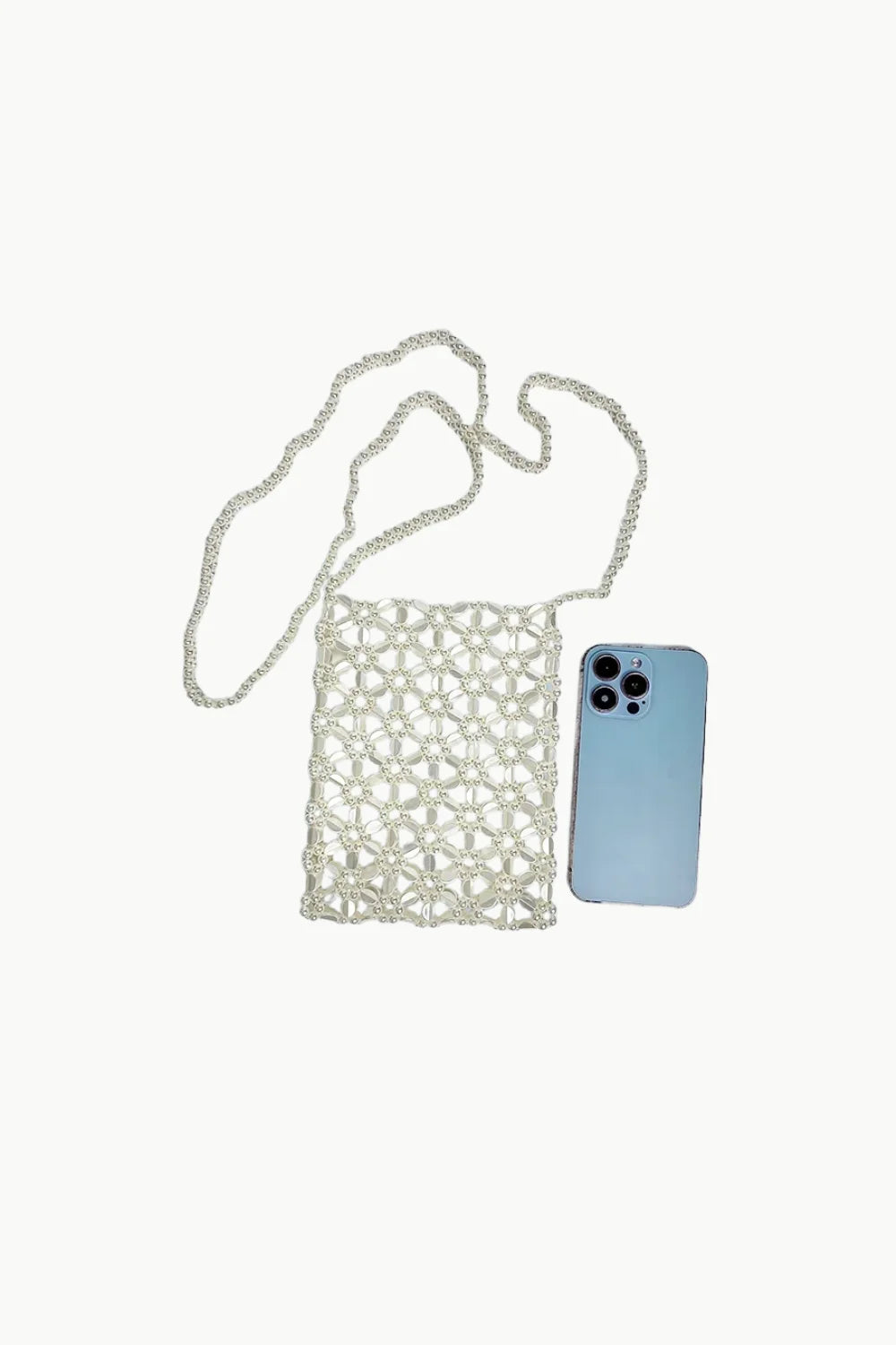White beaded crossbody bag with long strap and white beaded design