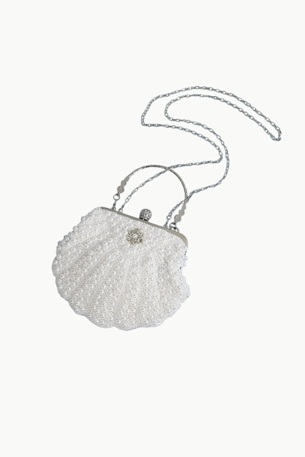 White pearl beaded seashell-shaped clutch with silver chain strap for elegant pearl clutch style