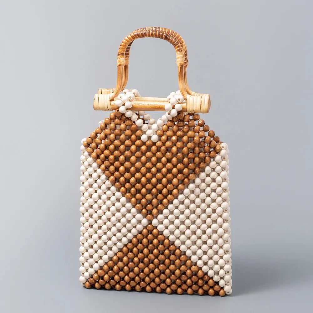 Handcrafted wood bead purse with woven handle and diamond pattern in light and dark brown beads