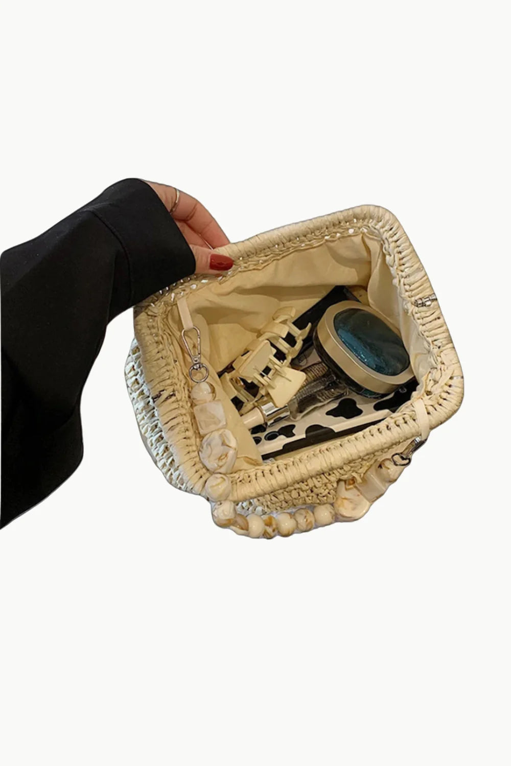 White woven bucket bag with cow print lining, stylish beaded shoulder bag for women