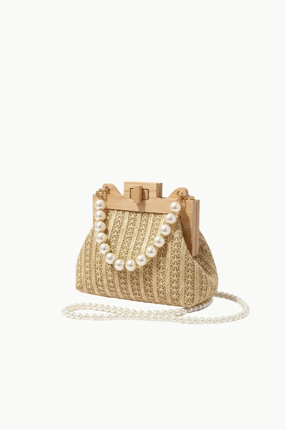 Beige woven straw beaded crossbody bag with wooden frame, pearls, and detachable strap