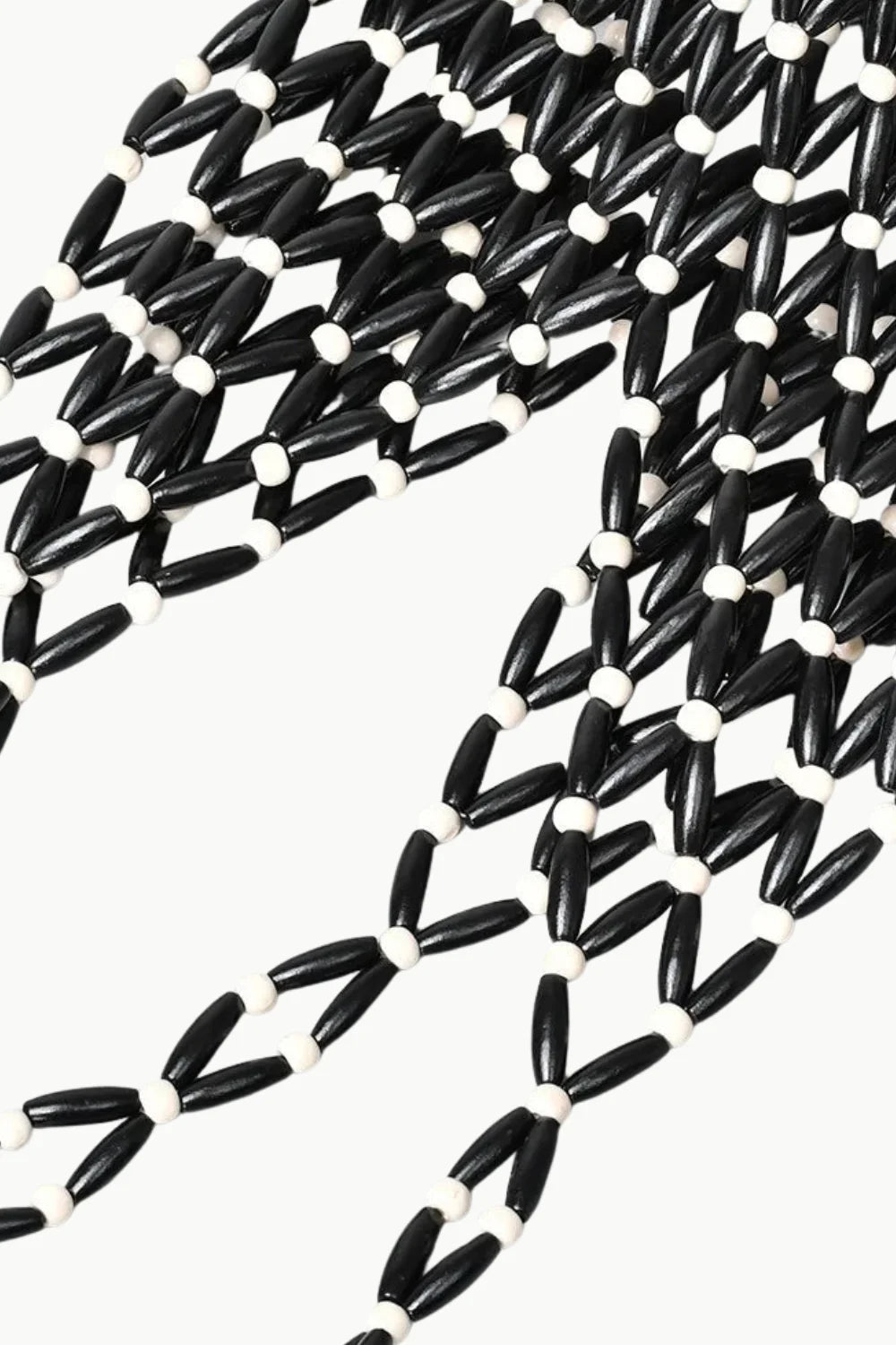 Black and white beaded netting fringe on wooden beaded tote bag for stylish accessory